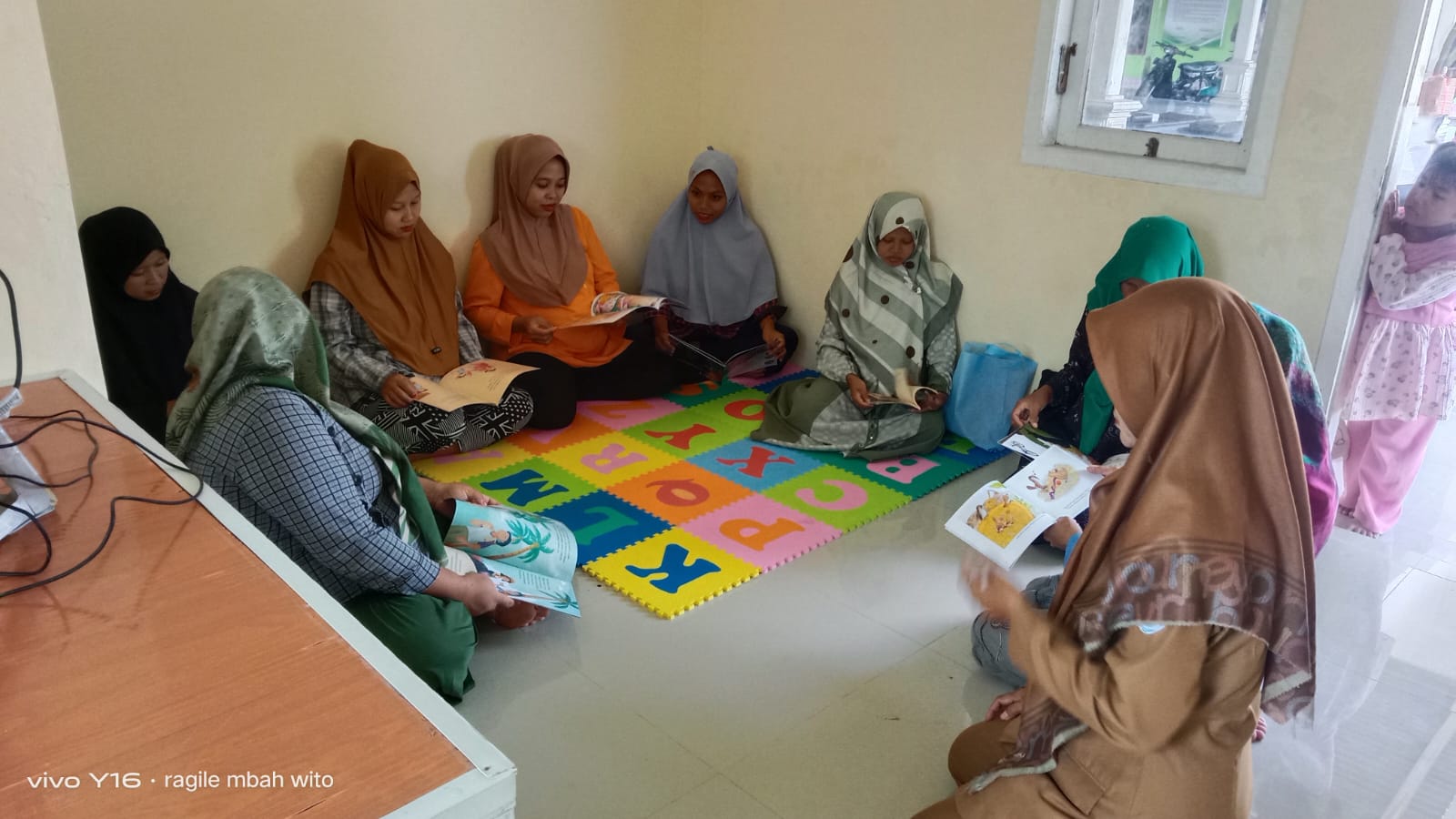 Kegiatan Baca Bersama Ibu-Ibu PKK